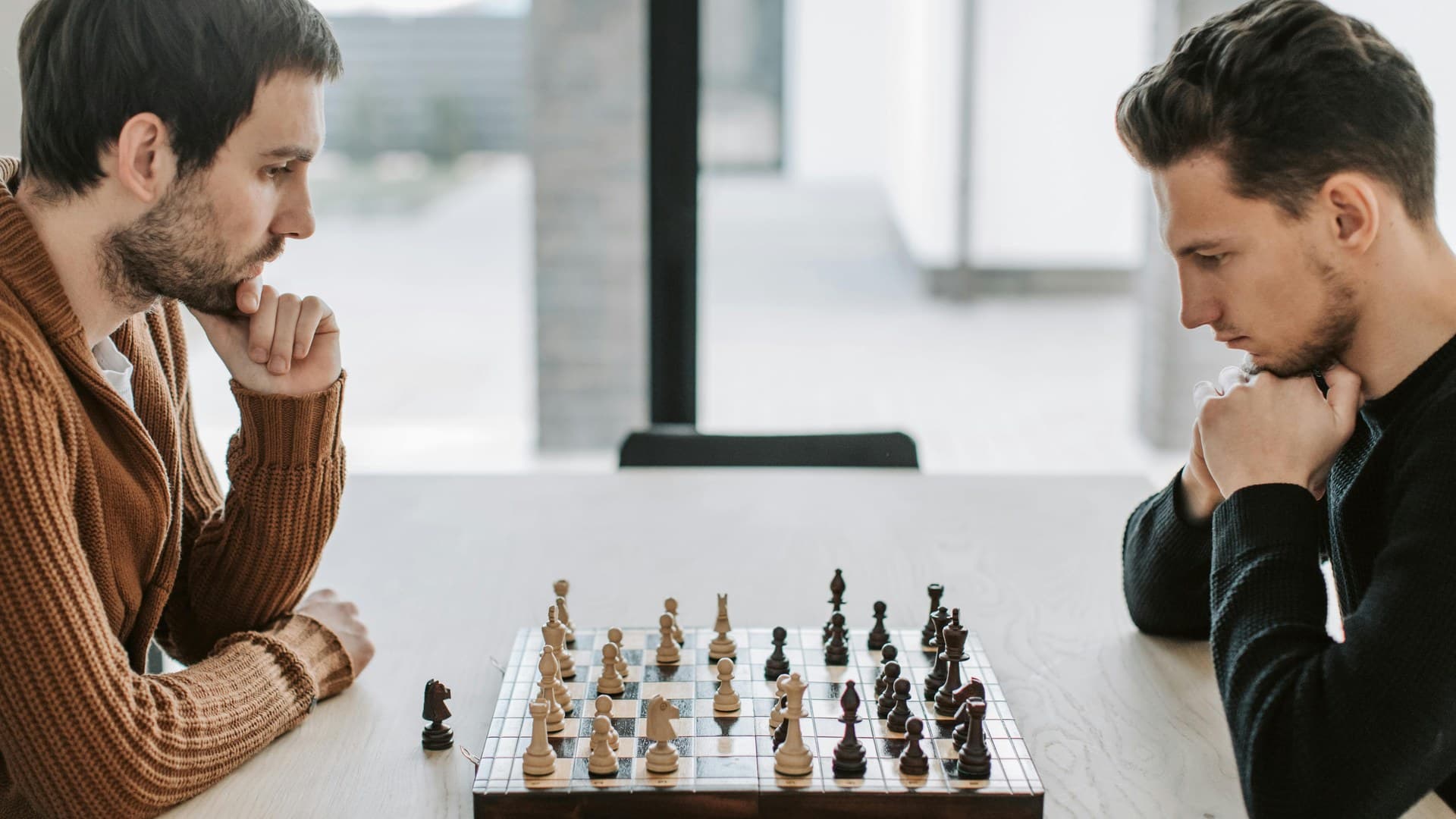 Why Claude Can't Catch Its Own Tells: Cross-Model Adversarial Review